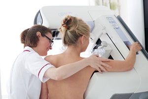 Patient undergoing a mammogram